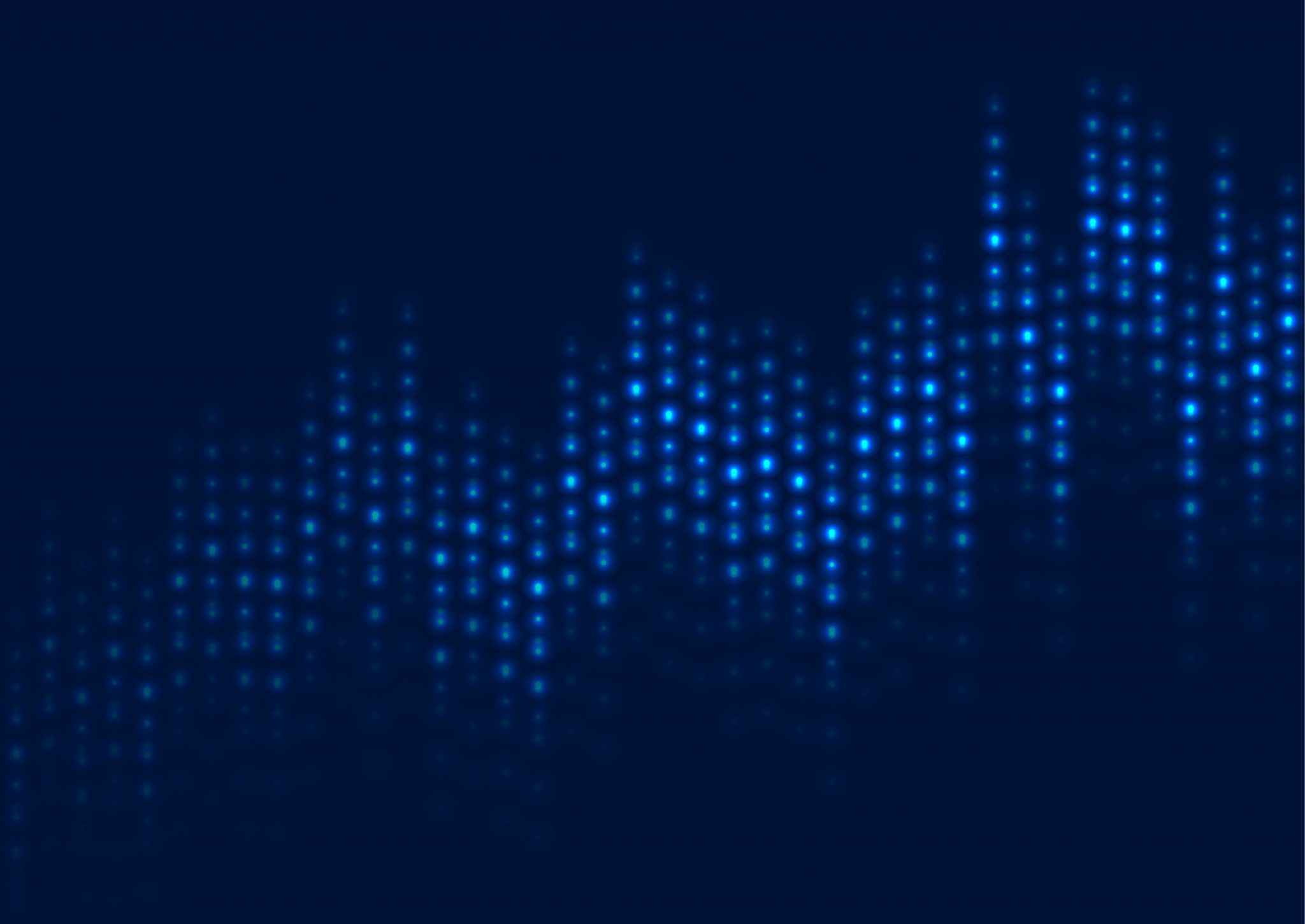 Pattern of light blue dots on a dark background